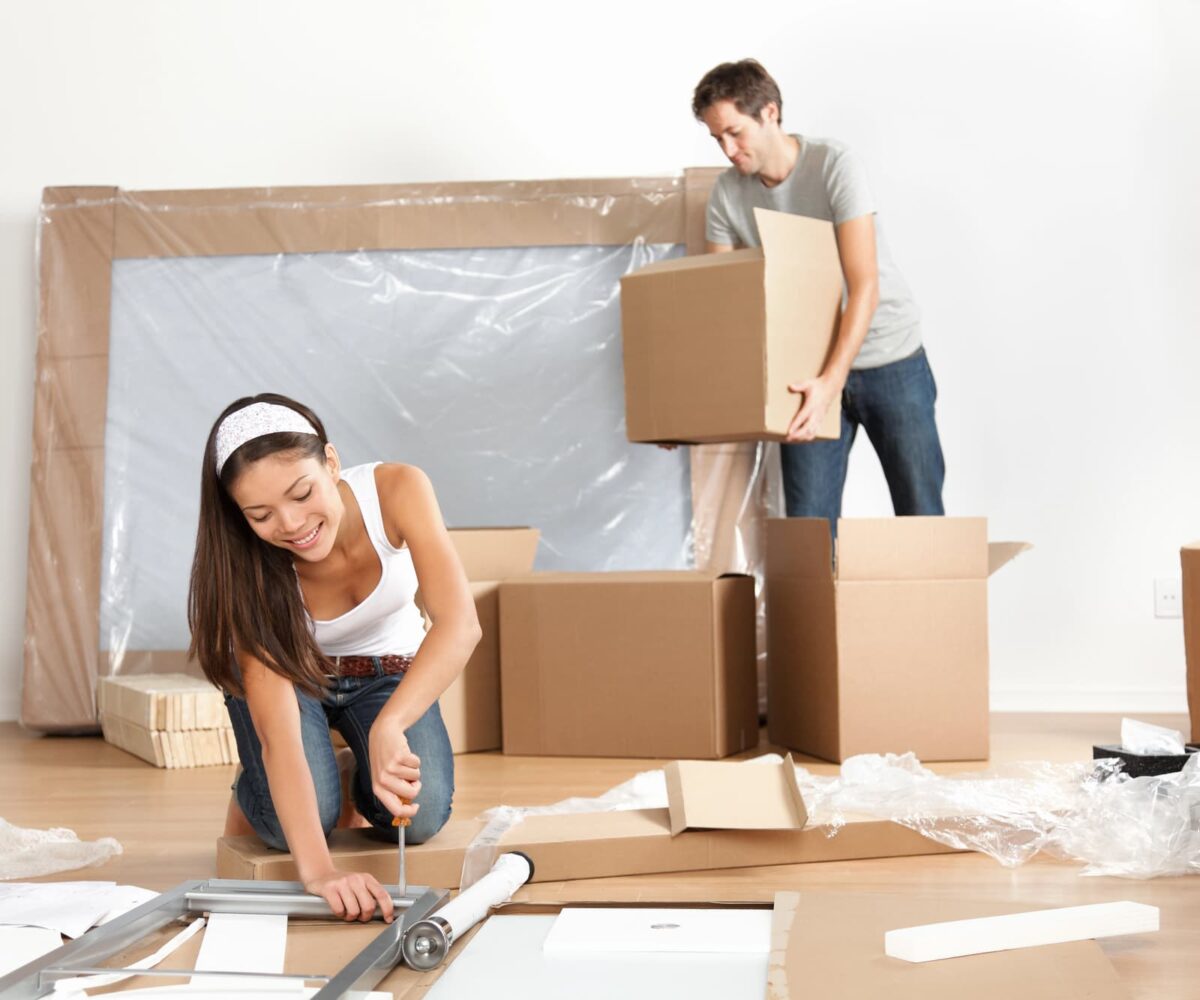 A young couple moving into an apartment together.