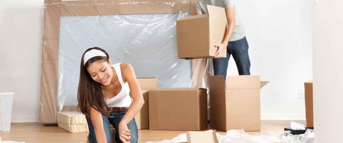 A young couple moving into an apartment together.