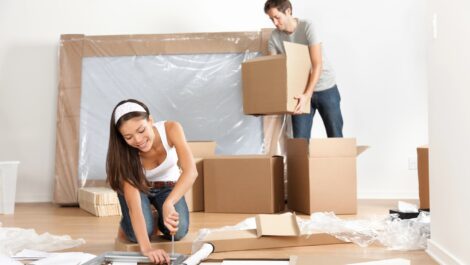 A young couple moving into an apartment together.